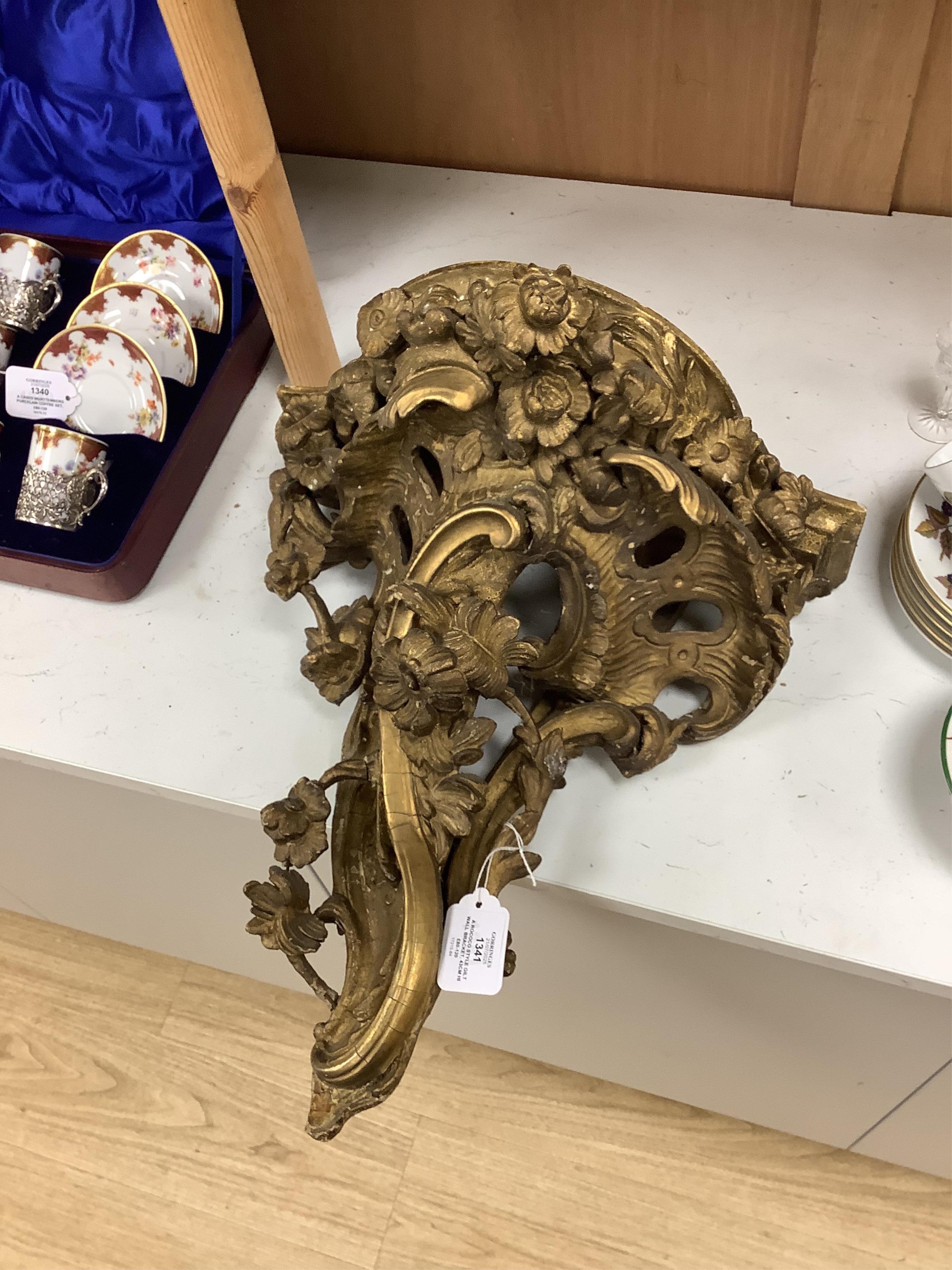 A Rococo style gilt wall bracket, 43cm high